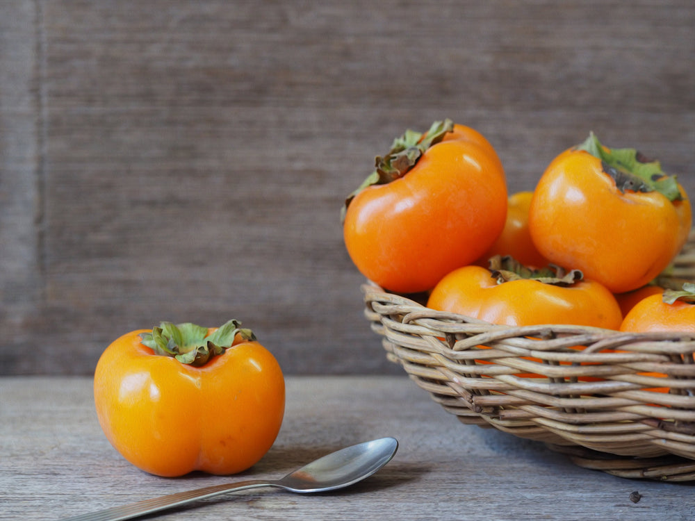 Persimmons in a basket