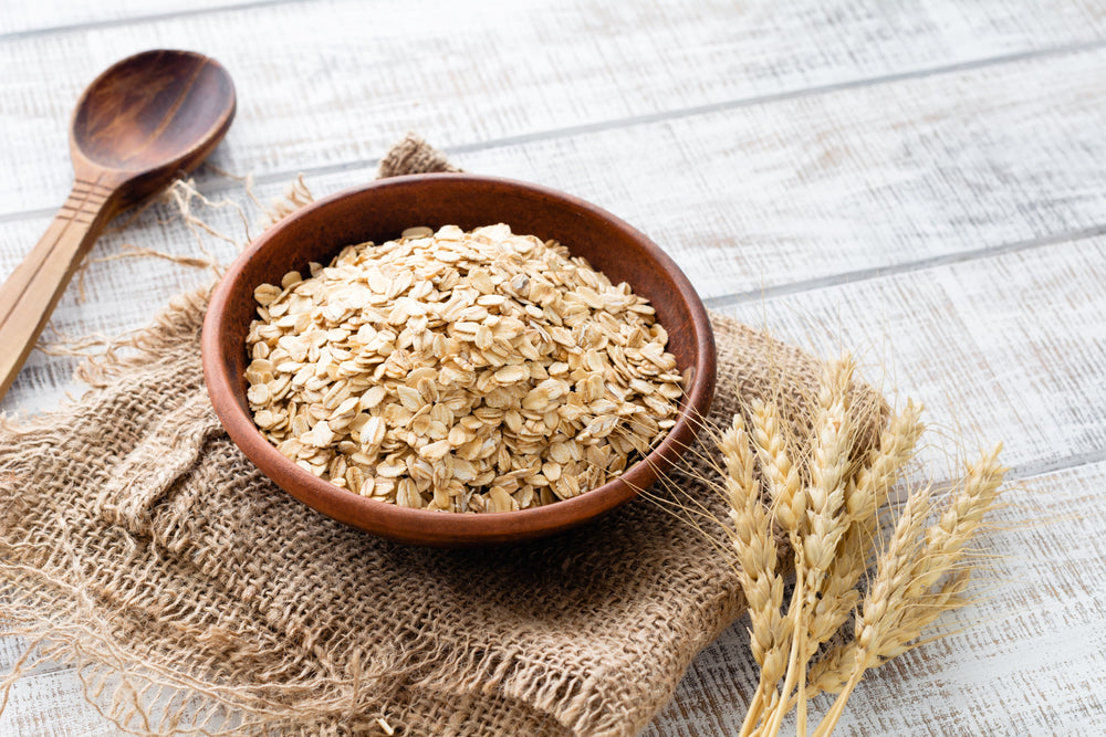 Oats in a wooden bowl